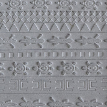 sample in clay of Mega Texture Tile - Desert Race. Use to impress texture in soft clays. Mega Texture Tiles are perfect for projects both large and small. Mega Tiles measure 9-1/4" x 6" and are about 7 times larger than Texture Tiles. These textures are flexible, washable and can be used with any soft clay.