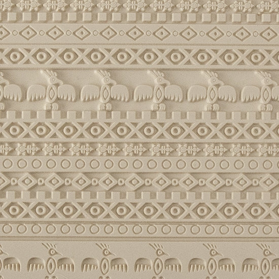 Mega Texture Tile - Tribal Spirits Embossed. Use to impress texture in soft clays. Mega Texture Tiles are perfect for projects both large and small. Mega Tiles measure 9-1/4" x 6" and are about 7 times larger than Texture Tiles. These textures are flexible, washable and can be used with any soft clay.