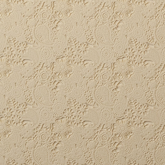 Mega Texture Tile - Daisy Paisley. Use to impress texture in soft clays. Mega Texture Tiles are perfect for projects both large and small. Mega Tiles measure 9-1/4" x 6" and are about 7 times larger than Texture Tiles. These textures are flexible, washable and can be used with any soft clay.