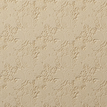 Mega Texture Tile - Daisy Paisley. Use to impress texture in soft clays. Mega Texture Tiles are perfect for projects both large and small. Mega Tiles measure 9-1/4" x 6" and are about 7 times larger than Texture Tiles. These textures are flexible, washable and can be used with any soft clay.