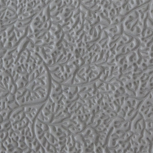 sample in clay of Mega Texture Tile - Branching Out. Use to impress texture in soft clays. Mega Texture Tiles are perfect for projects both large and small. Mega Tiles measure 9-1/4" x 6" and are about 7 times larger than Texture Tiles. These textures are flexible, washable and can be used with any soft clay.