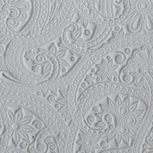 sample in clay of Mega Texture Tile - Eastern Paisley. Use to impress texture in soft clays. Mega Texture Tiles are perfect for projects both large and small. Mega Tiles measure 9-1/4" x 6" and are about 7 times larger than Texture Tiles. These textures are flexible, washable and can be used with any soft clay.