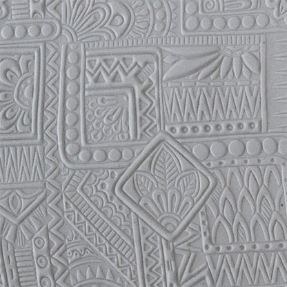 sample in clay of Mega Texture Tile - Botany Borders. Use to impress texture in soft clays. Mega Texture Tiles are perfect for projects both large and small. Mega Tiles measure 9-1/4" x 6" and are about 7 times larger than Texture Tiles. These textures are flexible, washable and can be used with any soft clay.