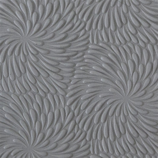 sample in clay of Mega Texture Tile - Fireworks Fineline. Use to impress texture in soft clays. Mega Texture Tiles are perfect for projects both large and small. Mega Tiles measure 9-1/4" x 6" and are about 7 times larger than Texture Tiles. These textures are flexible, washable and can be used with any soft clay.