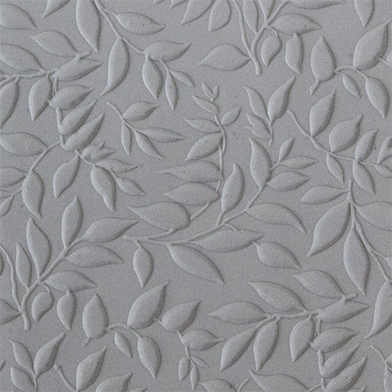 sample in clay of Mega Texture Tile - Simple Leaves Embossed. Use to impress texture in soft clays. Mega Texture Tiles are perfect for projects both large and small. Mega Tiles measure 9-1/4" x 6" and are about 7 times larger than Texture Tiles. These textures are flexible, washable and can be used with any soft clay.