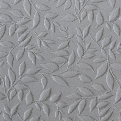 sample in clay of Mega Texture Tile - Simple Leaves Embossed. Use to impress texture in soft clays. Mega Texture Tiles are perfect for projects both large and small. Mega Tiles measure 9-1/4" x 6" and are about 7 times larger than Texture Tiles. These textures are flexible, washable and can be used with any soft clay.