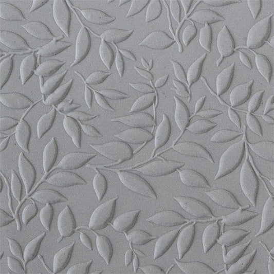 sample in clay of Mega Texture Tile - Simple Leaves Embossed. Use to impress texture in soft clays. Mega Texture Tiles are perfect for projects both large and small. Mega Tiles measure 9-1/4" x 6" and are about 7 times larger than Texture Tiles. These textures are flexible, washable and can be used with any soft clay.