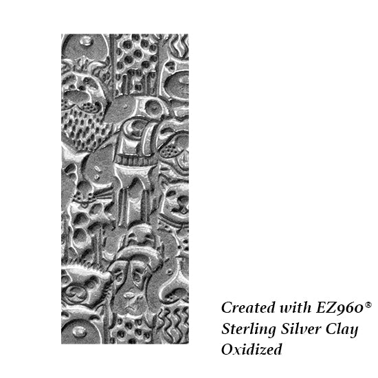 silver sample of Mega Texture Tile - Canine Companions. Use to impress texture in soft clays. Mega Texture Tiles are perfect for projects both large and small. Mega Tiles measure 9-1/4" x 6" and are about 7 times larger than Texture Tiles. These textures are flexible, washable and can be used with any soft clay.