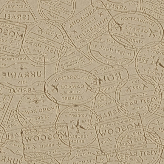 Mega Texture Tile - Bon Voyage Embossed. Use to impress texture in soft clays. Mega Texture Tiles are perfect for projects both large and small. Mega Tiles measure 9-1/4" x 6" and are about 7 times larger than Texture Tiles. These textures are flexible, washable and can be used with any soft clay.