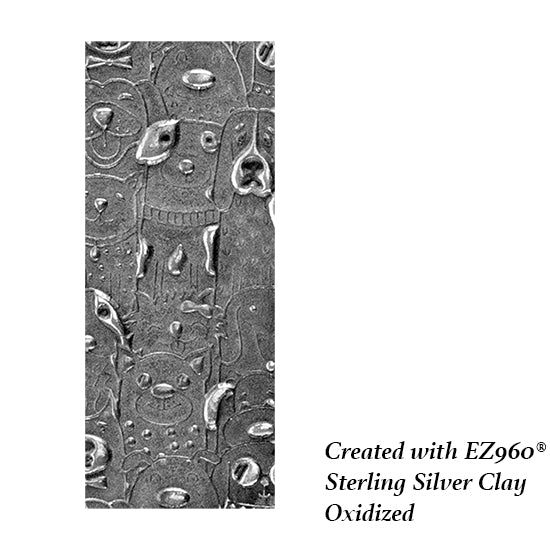 silver sample of Canine Companions Embossed. Use to impress texture in soft clays. Mega Texture Tiles are perfect for projects both large and small. Mega Tiles measure 9-1/4" x 6" and are about 7 times larger than Texture Tiles. These textures are flexible, washable and can be used with any soft clay.