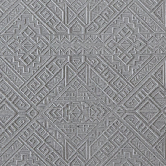 sample in clay of Mega Texture Tile - Navajo Rug Embossed. Use to impress texture in soft clays. Mega Texture Tiles are perfect for projects both large and small. Mega Tiles measure 9-1/4" x 6" and are about 7 times larger than Texture Tiles. These textures are flexible, washable and can be used with any soft clay.