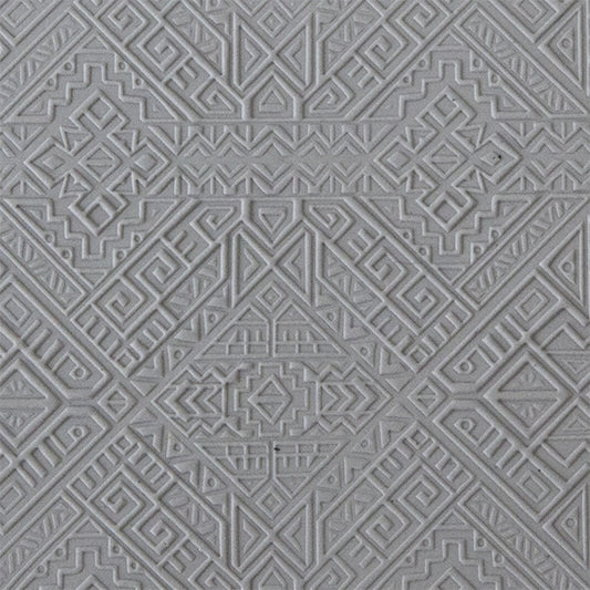 sample in clay of Mega Texture Tile - Navajo Rug Embossed. Use to impress texture in soft clays. Mega Texture Tiles are perfect for projects both large and small. Mega Tiles measure 9-1/4" x 6" and are about 7 times larger than Texture Tiles. These textures are flexible, washable and can be used with any soft clay.