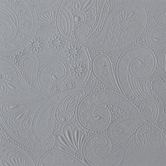 sample in clay of Mega Texture Tile - Waves of Paisley Embossed. Use to impress texture in soft clays. Mega Texture Tiles are perfect for projects both large and small. Mega Tiles measure 9-1/4" x 6" and are about 7 times larger than Texture Tiles. These textures are flexible, washable and can be used with any soft clay.