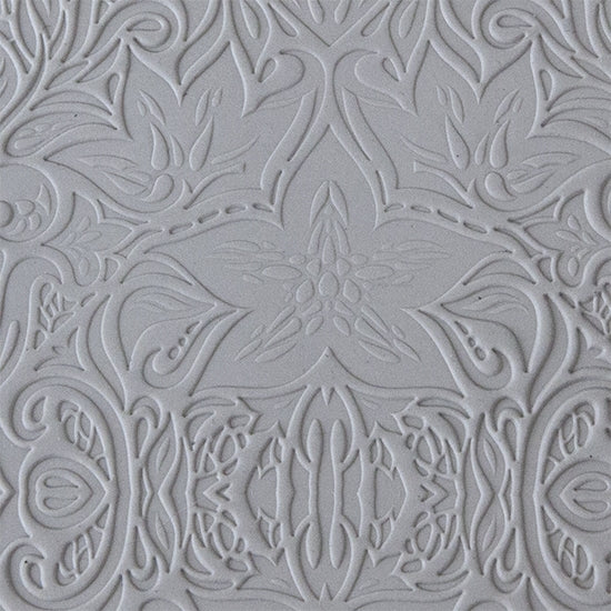 sample in clay of Mega Texture Tile - Lavish Lillies. Use to impress texture in soft clays. Mega Texture Tiles are perfect for projects both large and small. Mega Tiles measure 9-1/4" x 6" and are about 7 times larger than Texture Tiles. These textures are flexible, washable and can be used with any soft clay.