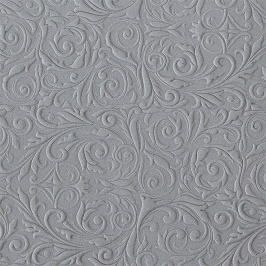 sample in clay of Mega Texture Tile - Damask. Use to impress texture in soft clays. Mega Texture Tiles are perfect for projects both large and small. Mega Tiles measure 9-1/4" x 6" and are about 7 times larger than Texture Tiles. These textures are flexible, washable and can be used with any soft clay.