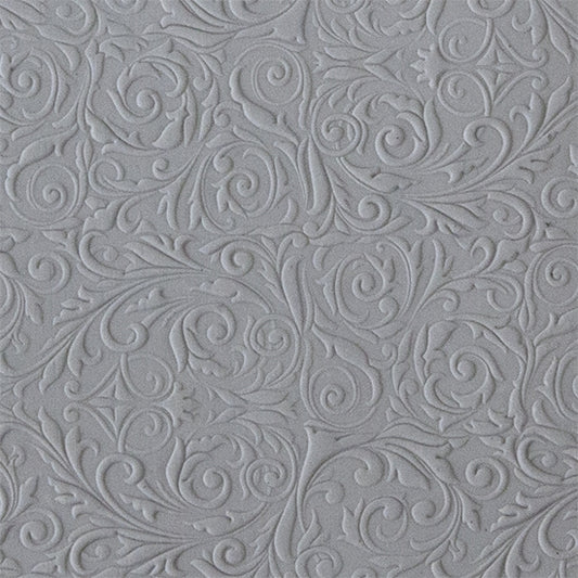 sample in clay of Mega Texture Tile - Damask. Use to impress texture in soft clays. Mega Texture Tiles are perfect for projects both large and small. Mega Tiles measure 9-1/4" x 6" and are about 7 times larger than Texture Tiles. These textures are flexible, washable and can be used with any soft clay.