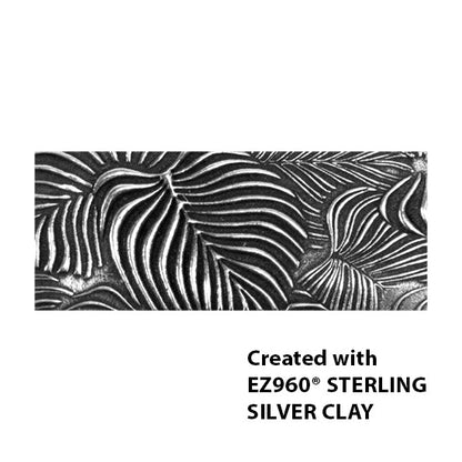 silver sample of Mega Texture Tile - In the Tropics. Use to impress texture in soft clays. Mega Texture Tiles are perfect for projects both large and small. Mega Tiles measure 9-1/4" x 6" and are about 7 times larger than Texture Tiles. These textures are flexible, washable and can be used with any soft clay.