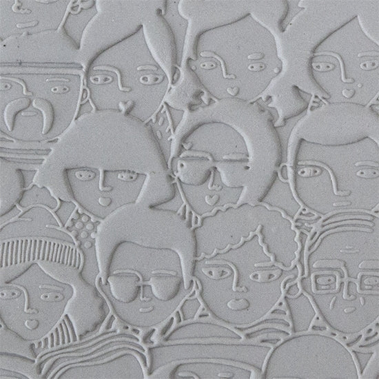 sample in clay of Mega Texture Tile - A Face in the Crowd Embossed First picture shown in texture in clay.  Use to impress texture in soft clays. Mega Texture Tiles are perfect for projects both large and small. Mega Tiles measure 9-1/4" x 6" and are about 7 times larger than Texture Tiles. These textures are flexible, washable and can be used with any soft clay.