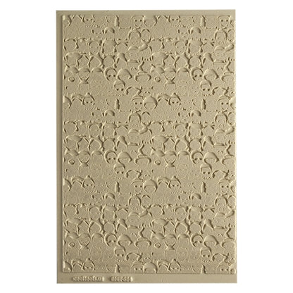 Mega Texture Tile - A Face in the Crowd Embossed First picture shown in texture in clay.  Use to impress texture in soft clays. Mega Texture Tiles are perfect for projects both large and small. Mega Tiles measure 9-1/4" x 6" and are about 7 times larger than Texture Tiles. These textures are flexible, washable and can be used with any soft clay.