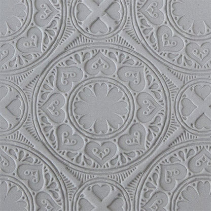 sample in clay of Mega Texture Tile - Vintage Wallpaper. Use to impress texture in soft clays. Mega Texture Tiles are perfect for projects both large and small. Mega Tiles measure 9-1/4" x 6" and are about 7 times larger than Texture Tiles. These textures are flexible, washable and can be used with any soft clay.