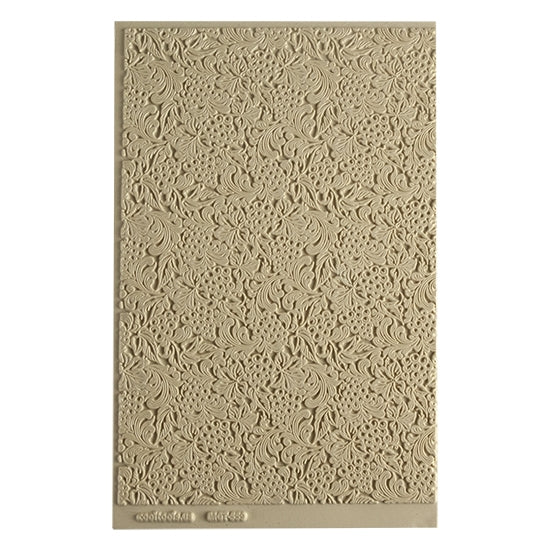 Mega Texture Tile - Tuscany Dreams. Use to impress texture in soft clays. Mega Texture Tiles are perfect for projects both large and small. Mega Tiles measure 9-1/4" x 6" and are about 7 times larger than Texture Tiles. These textures are flexible, washable and can be used with any soft clay.