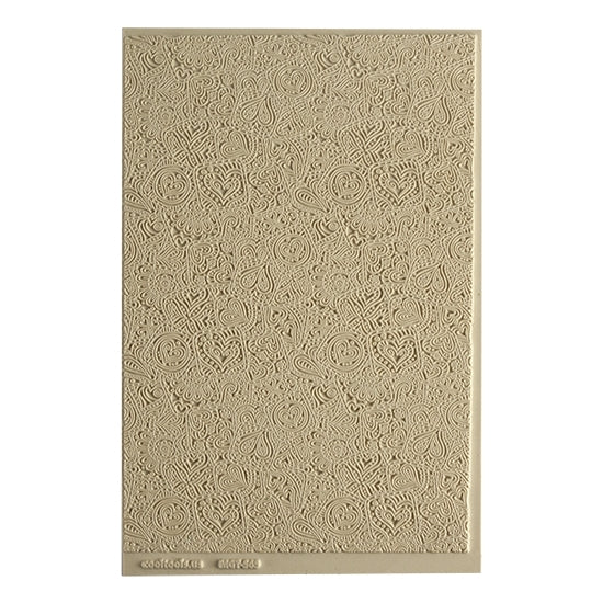 Mega Texture Tile - Doodling Hearts. Use to impress texture in soft clays. Mega Texture Tiles are perfect for projects both large and small. Mega Tiles measure 9-1/4" x 6" and are about 7 times larger than Texture Tiles. These textures are flexible, washable and can be used with any soft clay.