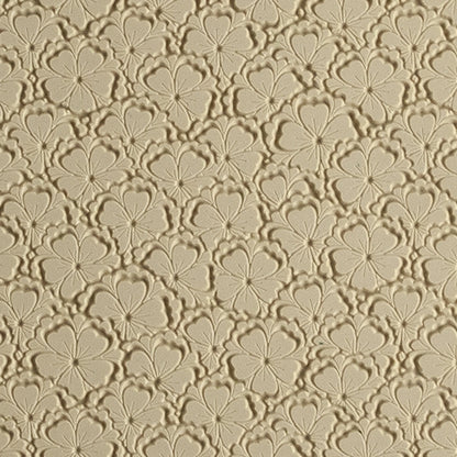 Mega Texture Tile - Flowering Fields Embossed. Use to impress texture in soft clays. Mega Texture Tiles are perfect for projects both large and small. Mega Tiles measure 9-1/4" x 6" and are about 7 times larger than Texture Tiles. These textures are flexible, washable and can be used with any soft clay.