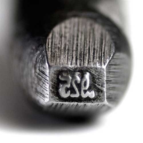 Quality Stamp - .925 - Bent 2mm A "quality mark" is the number or letters that indicate what metal and purity is used in an item made of a precious metal. By law, this stamp can only be used to mark an item that is made from sterling silver. The bent stamp has the advantage of fitting inside of a ring shank to mark rings as well as other items.