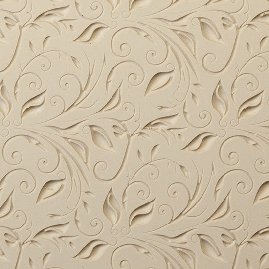 Rollable Texture Tile - Leaves and Tendrils Fineline. Rollable Texture Tiles measure 4" x 5-1/2" overall and have a textured area of 2-3/8" x 4-7/8"; perfect for larger projects. Each texture has a shoulder that allows one of our Clay Thickness Rolling Frames to sit directly on the texture for rolling. Rollable Texture Tiles are flexible, washable and can be used with any soft clay. Spritz with CoolSlip or dust on Dry Powder Release for stick-free impressions when using metal clay and polymer clay.