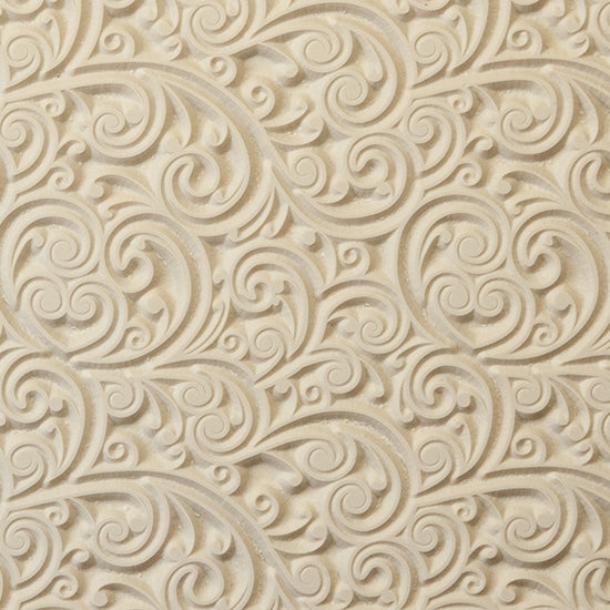 Rollable Texture Tile - Curly Vines. Rollable Texture Tiles measure 4" x 5-1/2" overall and have a textured area of 2-3/8" x 4-7/8"; perfect for larger projects. Each texture has a shoulder that allows one of our Clay Thickness Rolling Frames to sit directly on the texture for rolling. Rollable Texture Tiles are flexible, washable and can be used with any soft clay. Spritz with CoolSlip or dust on Dry Powder Release for stick-free impressions when using metal clay and polymer clay.