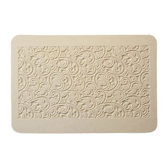 Rollable Texture Tile - Curly Vines. Rollable Texture Tiles measure 4" x 5-1/2" overall and have a textured area of 2-3/8" x 4-7/8"; perfect for larger projects. Each texture has a shoulder that allows one of our Clay Thickness Rolling Frames to sit directly on the texture for rolling. Rollable Texture Tiles are flexible, washable and can be used with any soft clay. Spritz with CoolSlip or dust on Dry Powder Release for stick-free impressions when using metal clay and polymer clay.