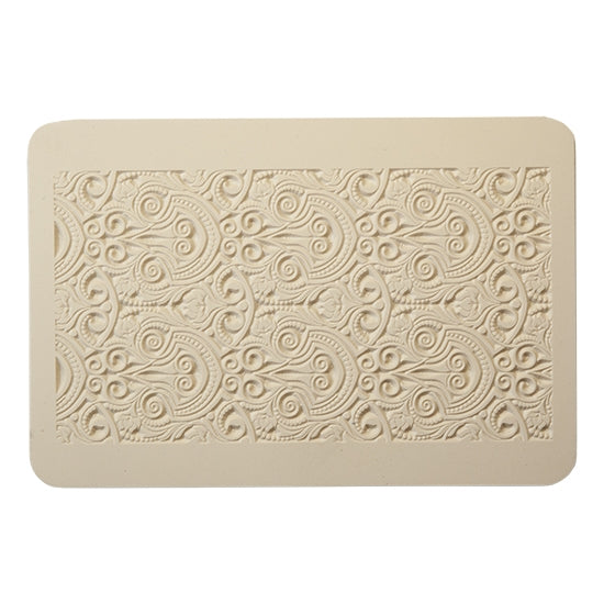 Rollable Texture Tile - Nouveau Bouquet. Rollable Texture Tiles measure 4" x 5-1/2" overall and have a textured area of 2-3/8" x 4-7/8"; perfect for larger projects. Each texture has a shoulder that allows one of our Clay Thickness Rolling Frames to sit directly on the texture for rolling. Rollable Texture Tiles are flexible, washable and can be used with any soft clay. Spritz with CoolSlip or dust on Dry Powder Release for stick-free impressions when using metal clay and polymer clay.