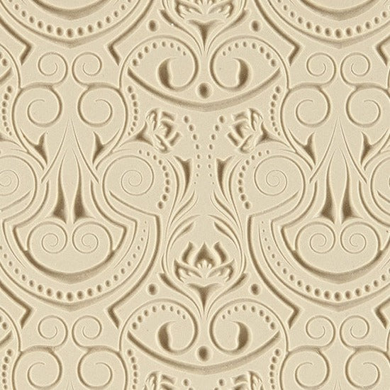 Rollable Texture Tile - Nouveau Boquet Embossed. Rollable Texture Tiles measure 4" x 5-1/2" overall and have a textured area of 2-3/8" x 4-7/8"; perfect for larger projects. Each texture has a shoulder that allows one of our Clay Thickness Rolling Frames to sit directly on the texture for rolling. Rollable Texture Tiles are flexible, washable and can be used with any soft clay. Spritz with CoolSlip or dust on Dry Powder Release for stick-free impressions when using metal clay and polymer clay.