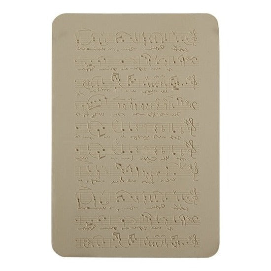 Rollable Texture Tile - Sheet Music Fineline. Rollable Texture Tiles measure 4" x 5-1/2" overall and have a textured area of 2-3/8" x 4-7/8"; perfect for larger projects. Each texture has a shoulder that allows one of our Clay Thickness Rolling Frames to sit directly on the texture for rolling. Rollable Texture Tiles are flexible, washable and can be used with any soft clay. Spritz with CoolSlip or dust on Dry Powder Release for stick-free impressions when using metal clay and polymer clay.