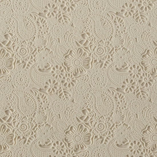 Rollable Texture Tile - Daisy Paisley. Rollable Texture Tiles measure 4" x 5-1/2" overall and have a textured area of 2-3/8" x 4-7/8"; perfect for larger projects. Each texture has a shoulder that allows one of our Clay Thickness Rolling Frames to sit directly on the texture for rolling. Rollable Texture Tiles are flexible, washable and can be used with any soft clay. Spritz with CoolSlip or dust on Dry Powder Release for stick-free impressions when using metal clay and polymer clay.