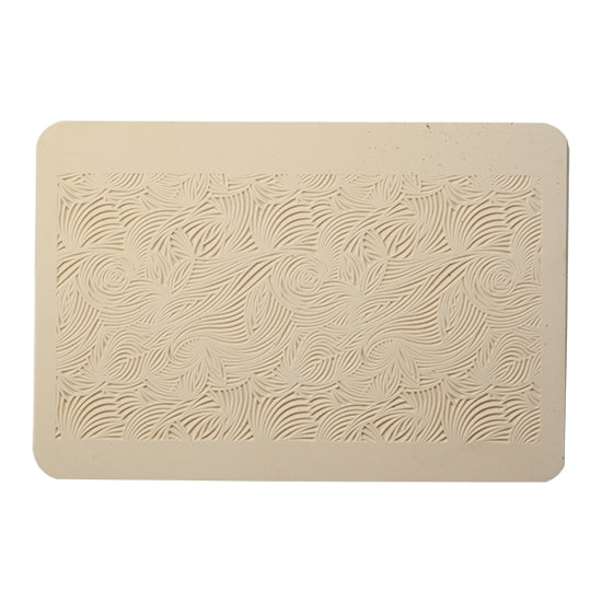 Rollable Texture Tile - Floral Scrolls. Rollable Texture Tiles measure 4" x 5-1/2" overall and have a textured area of 2-3/8" x 4-7/8"; perfect for larger projects. Each texture has a shoulder that allows one of our Clay Thickness Rolling Frames to sit directly on the texture for rolling. Rollable Texture Tiles are flexible, washable and can be used with any soft clay. Spritz with CoolSlip or dust on Dry Powder Release for stick-free impressions when using metal clay and polymer clay.