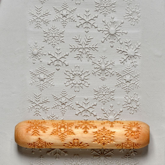 Large Wooden Hand Roller - Snowflakes rolled into clay