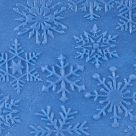 Large Wooden Hand Roller - Snowflakes rolled into blue clay