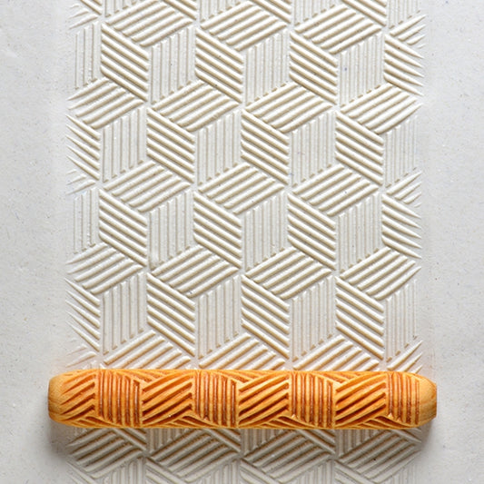 Wooden Hand Roller - Blocks rolled into white clay