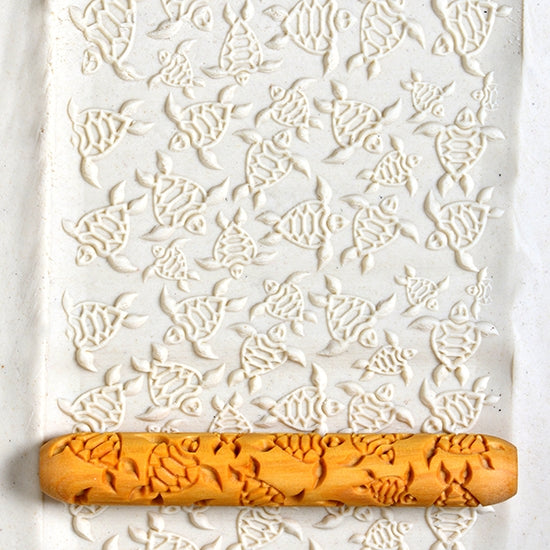 Wooden Hand Roller - Sea Turtles rolled into white clay