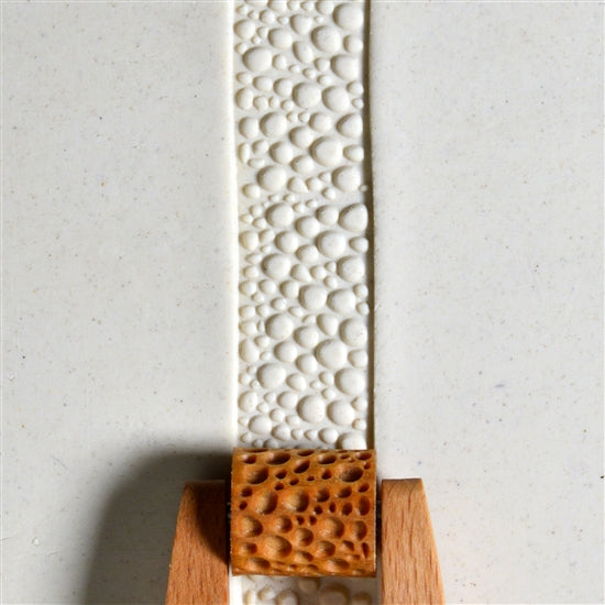 Wooden Mini Roller - Pebbles 20mm rolled into white clay