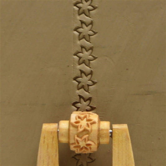 Wooden Mini Roller - Six Petaled Flower 10mm rolled into clay