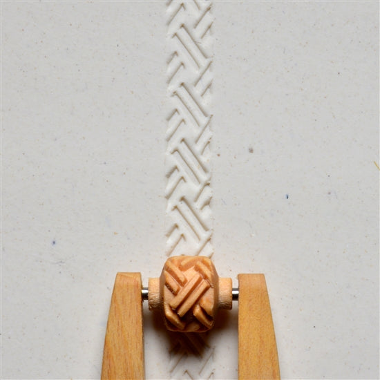 Wooden Mini Roller - Basketweave 1 - 10mm rolled into white clay