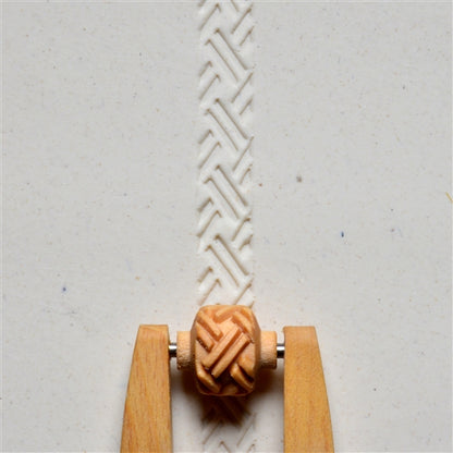 Wooden Mini Roller - Basketweave 1 - 10mm rolled into white clay