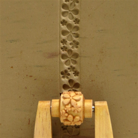 Wooden Mini Roller - Embossed Flower - 10mm rolled into clay