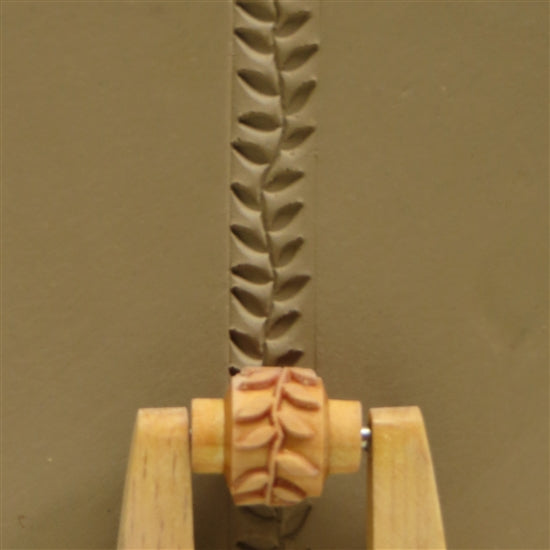 Wooden Mini Roller - Leafy Vine 10mm rolled into clay