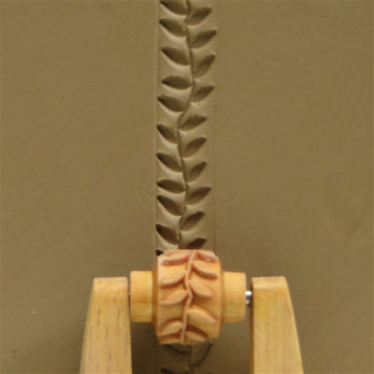 Wooden Mini Roller - Leafy Vine 10mm rolled into clay