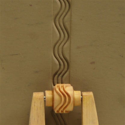 Wooden Mini Roller - Wavy Lines 10mm rolled into clay