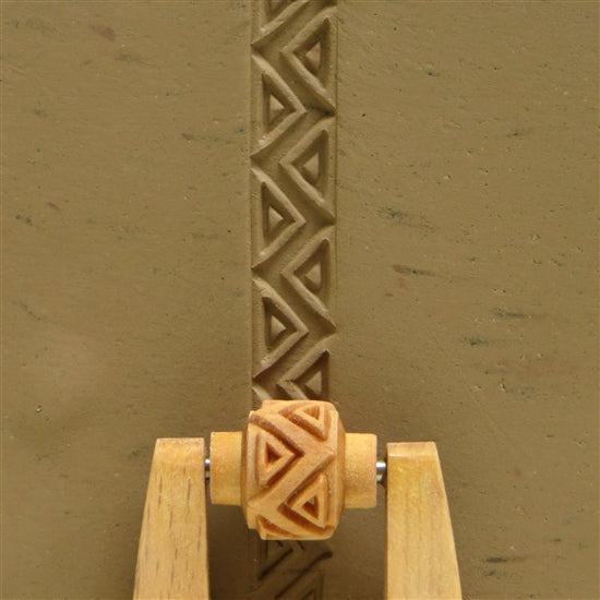 Wooden Mini Roller - Zigzag & Triangles 10mm rolled into clay