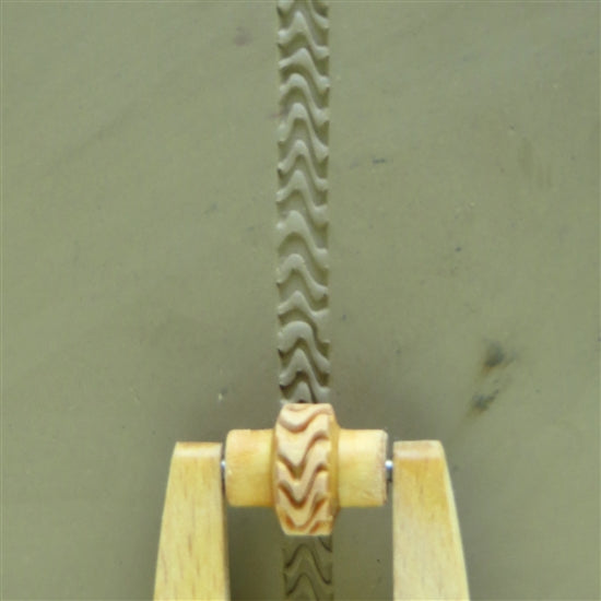 Wooden Mini Roller - Zebra Stripes 5mm rolled into clay